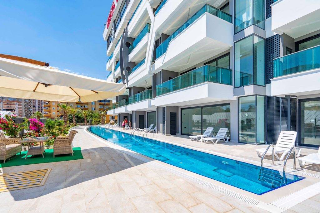 Nowe umeblowane, dwupoziomowe apartamenty na sprzedaż w Alanyi - Mahmutlar Turcja